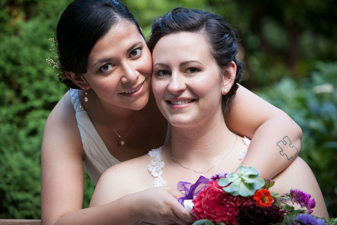Seattle wedding photographer Tom Ellis Photography. Close up wedding photo of Jessy and Kelsey, same-sex/lesbian couple, married at the Sorrento Hotel