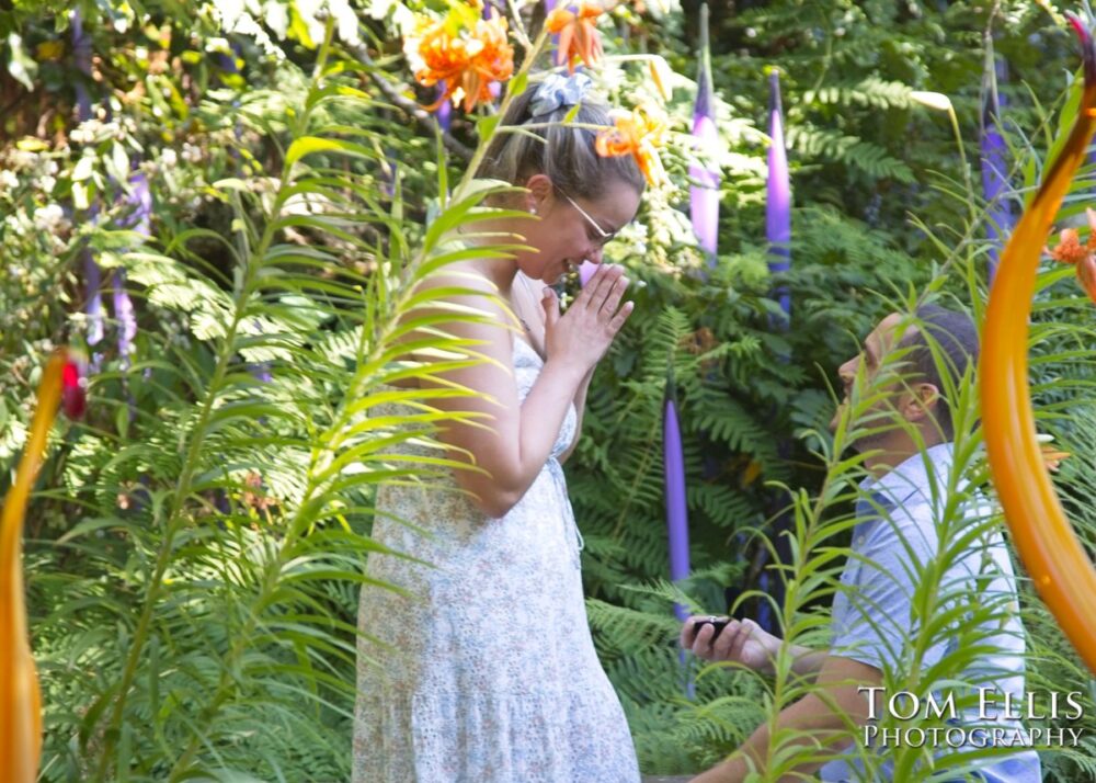 Ryan proposed to Ashley at the Chihuly Garden and Glass in Seattle. Tom Ellis Photography, Seattle proposal and engagement photographer