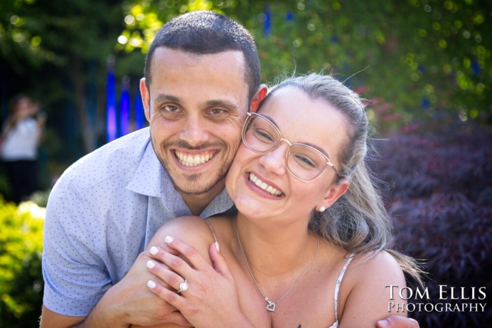 Ryan proposed to Ashley at the Chihuly Garden and Glass in Seattle. Tom Ellis Photography, Seattle proposal and engagement photographer