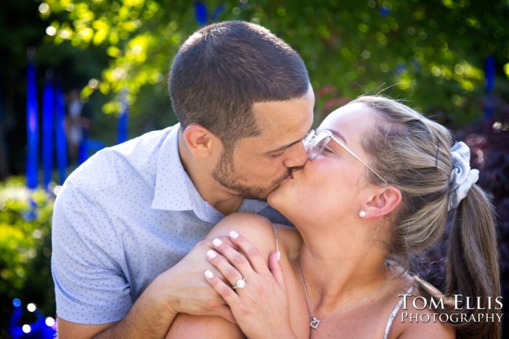 Ryan proposed to Ashley at the Chihuly Garden and Glass in Seattle. Tom Ellis Photography, Seattle proposal and engagement photographer